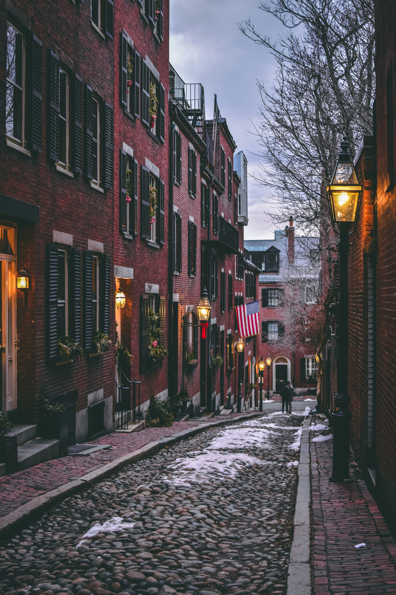 Acorn Street's cobblestones and gas lamps on Beacon Hill