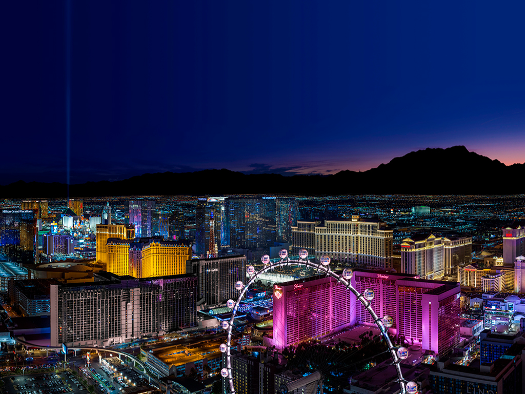The Las Vegas Strip at night with the High Roller and the Flamingo